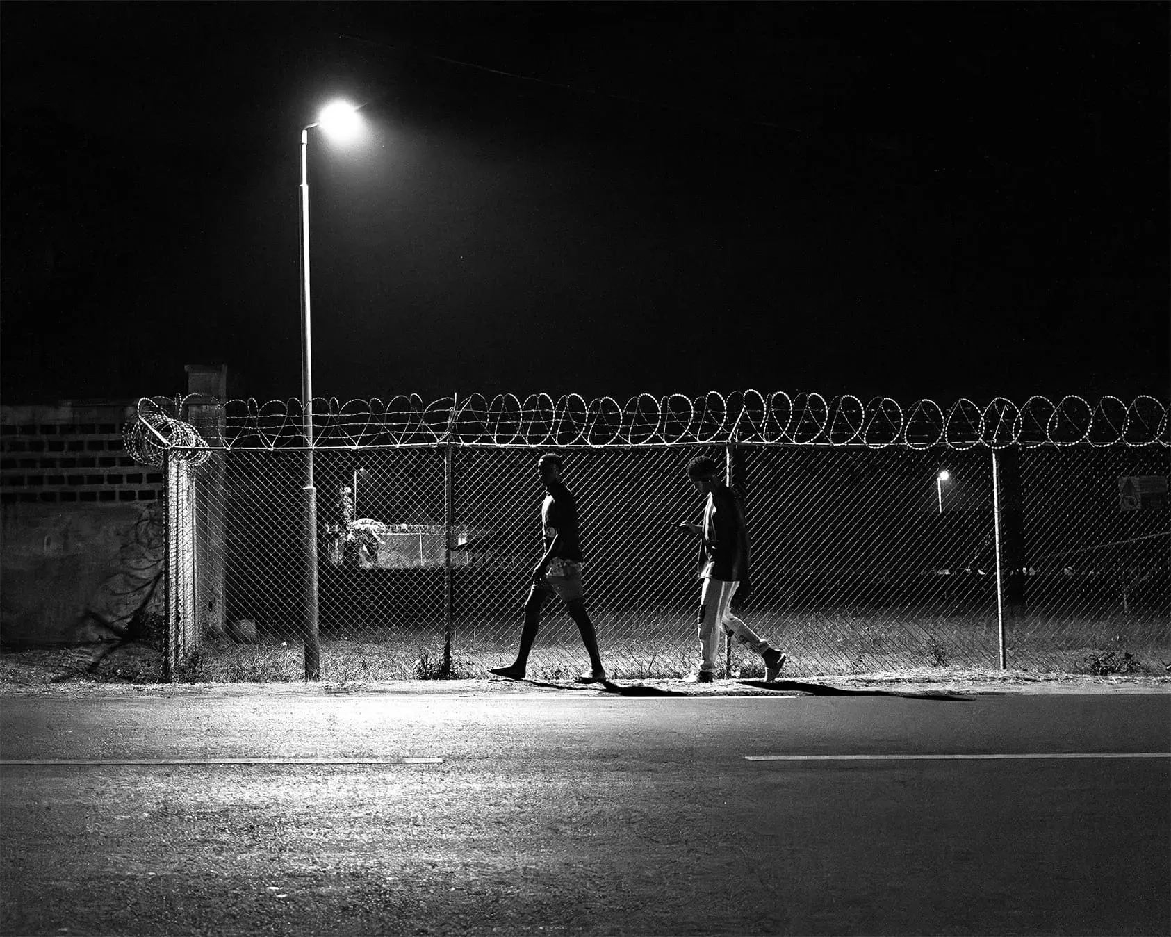 People staring at their phones, every street photographer’s nightmare.